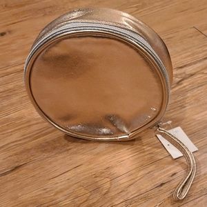 Rose gold circular cosmetic case
